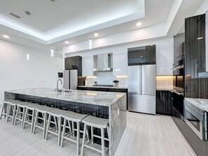 Fridge, microwave, oven, stovetop - Really Fun House with tons of room, huge pool plenty to do and a terrific view  (Kissimmee)