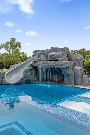 Outdoor pool, a heated pool - Really Fun House with tons of room, huge pool plenty to do and a terrific view  (Kissimmee)