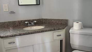 Hair dryer, towels, soap, toilet paper