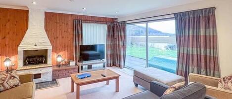 House | Living area | TV, fireplace