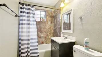 Hair dryer, towels, soap, shampoo