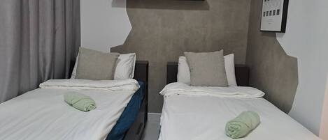 2 bedrooms, iron/ironing board, WiFi, bed sheets