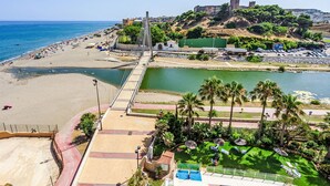 A beach resort with a bridge, swimming pool, and a historic castle. - Capitan by Interhome (Fuengirola)