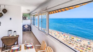A balcony with a view of the beach and ocean. - Capitan by Interhome (Fuengirola)