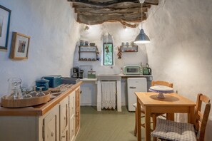 Fridge, stovetop, coffee/tea maker, electric kettle