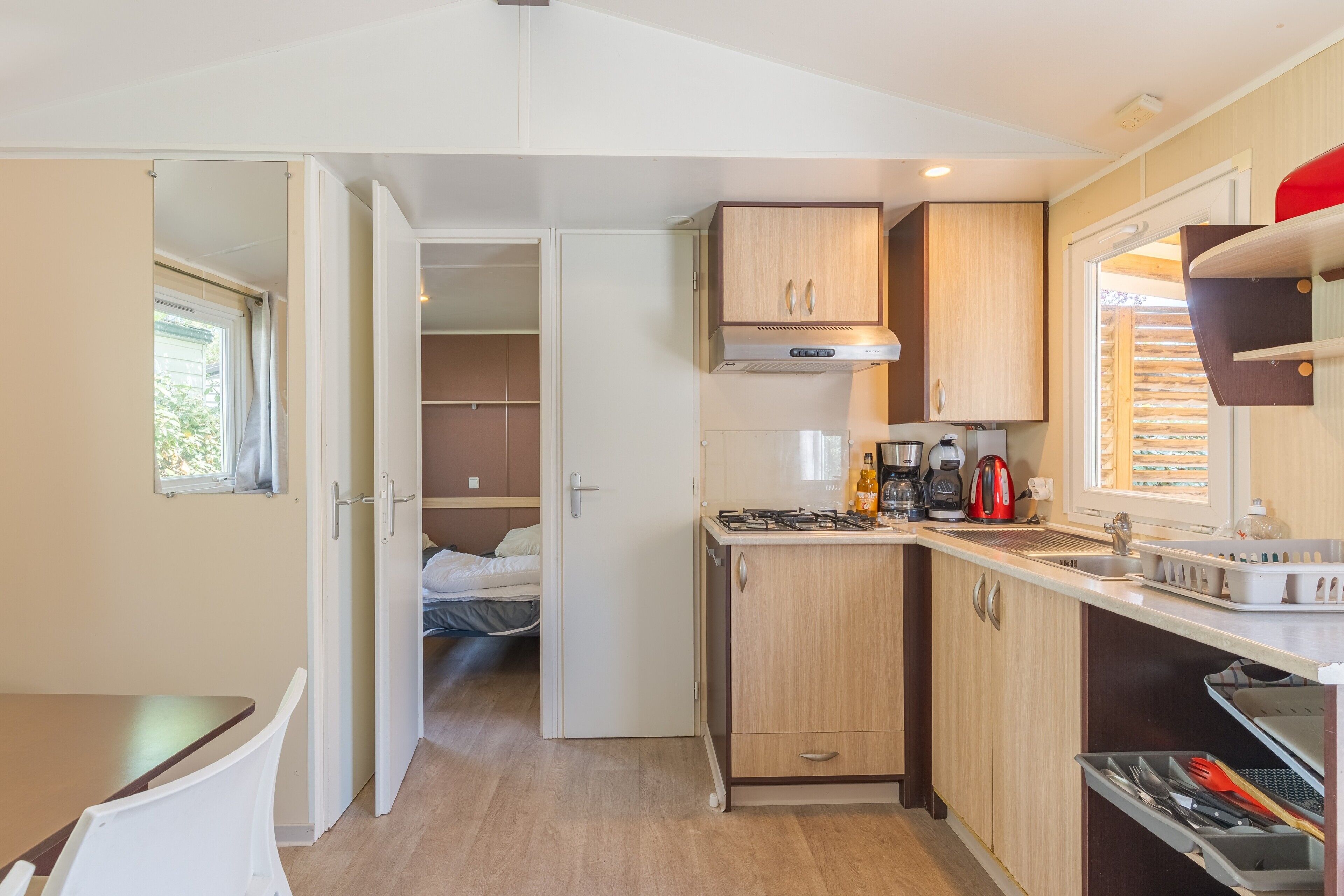 Fridge, microwave, stovetop, coffee/tea maker