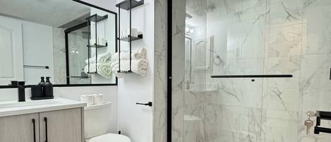 Shower, towels, soap, shampoo