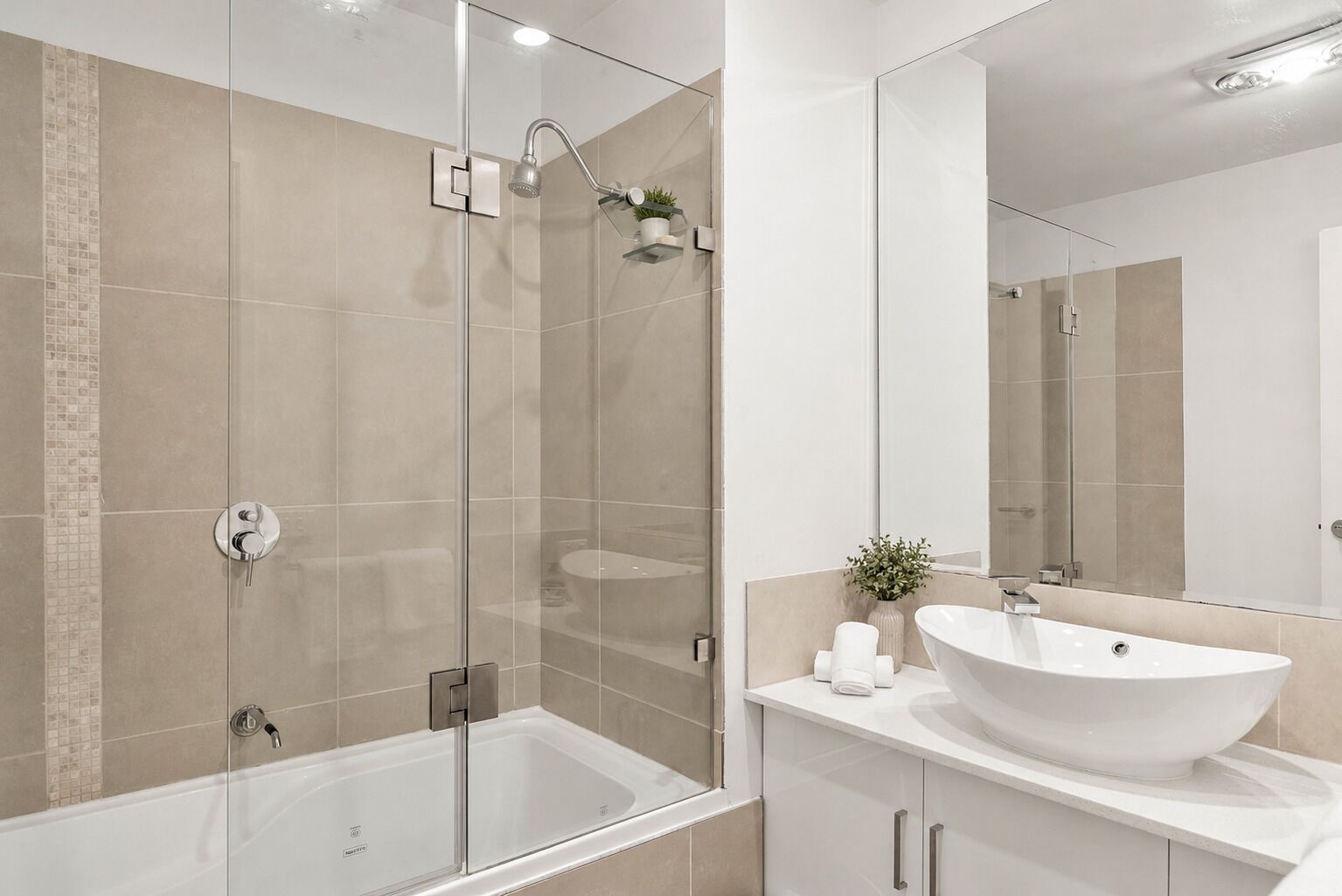 Shower, hair dryer, towels, toilet paper