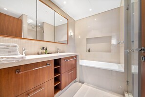 Shower, hair dryer, towels