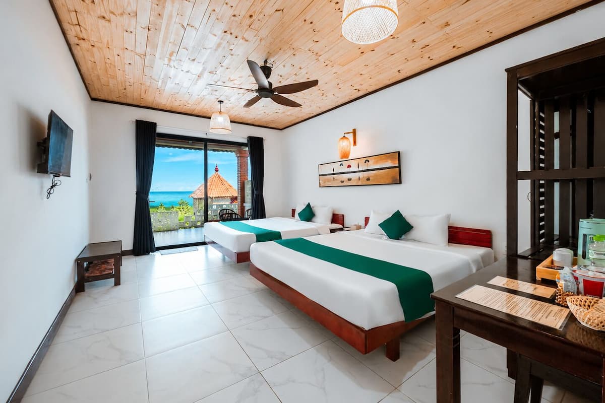 Adora Beachfront Grand | Ropa de cama de alta calidad, minibar, escritorio