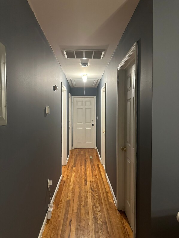 Basic Single Room, 1 Bedroom | Living area | Flat-screen TV