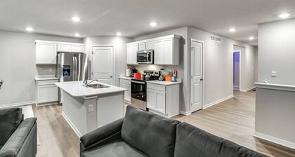 1 Mi to Golf: Quiet Waukee Home w/ Fireplace!