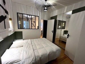 1 dormitorio, tabla de planchar con plancha, Internet y ropa de cama