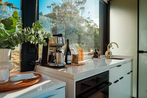 Fridge, microwave, coffee/tea maker, toaster