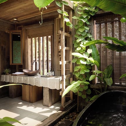 Separate tub and shower, rainfall showerhead, hair dryer, bathrobes