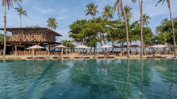 Outdoor pool, free pool cabanas, pool umbrellas
