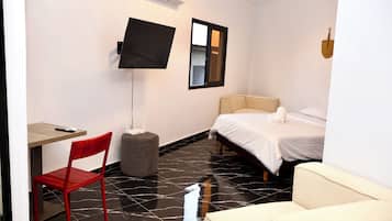 Suite estudio Confort, balcón, vistas a la ciudad | Wifi gratis