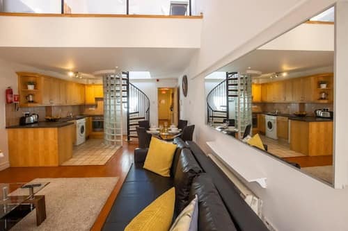 Deluxe Apartment, 2 Bedrooms, Kitchen | Living area | Flat-screen TV
