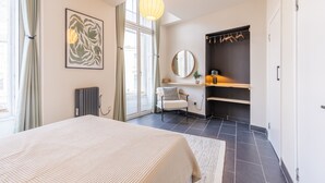 1 habitación, tabla de planchar con plancha, wifi gratis y ropa de cama 