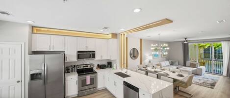 Coffee/tea maker, fridge, microwave, oven