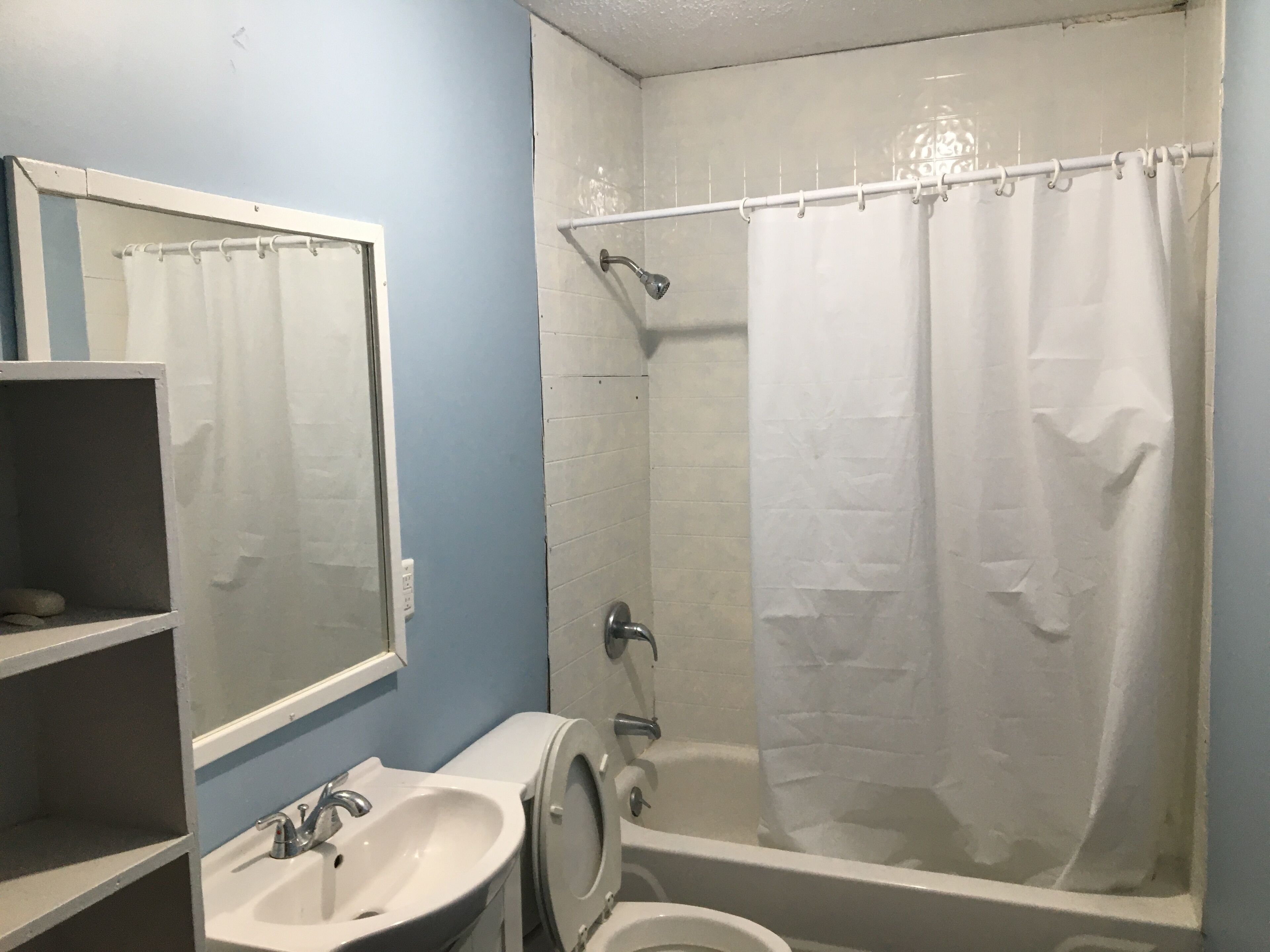 Shower, towels, soap, toilet paper