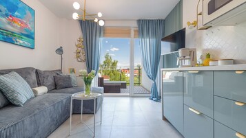 Apartment (A 30) | Living area | Flat-screen TV