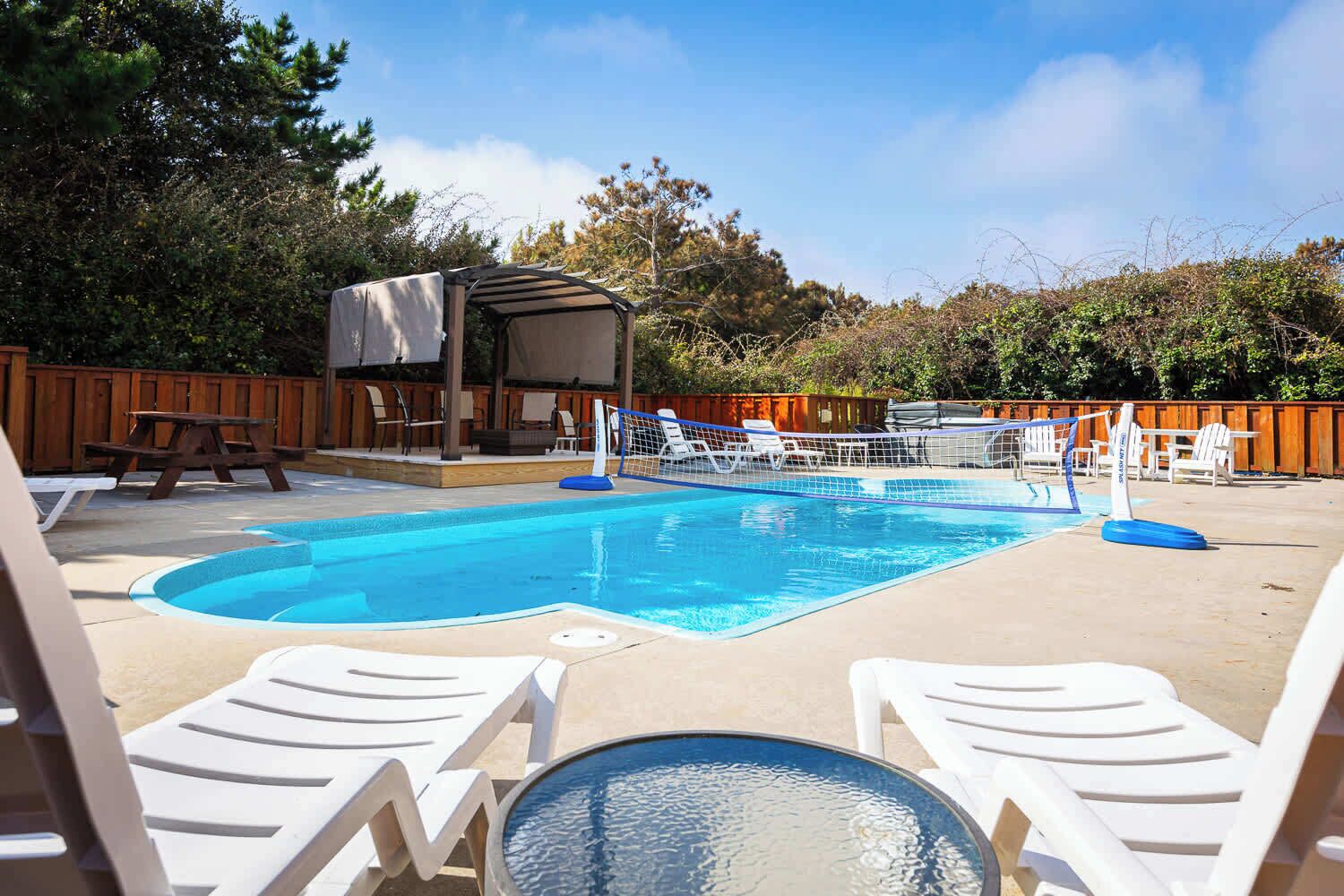 Private Pool w/ Ample Decking, a Tiki Bar with TV and Refrigerator, 8-Person Hot Tub, Cabana, and Fire Pit