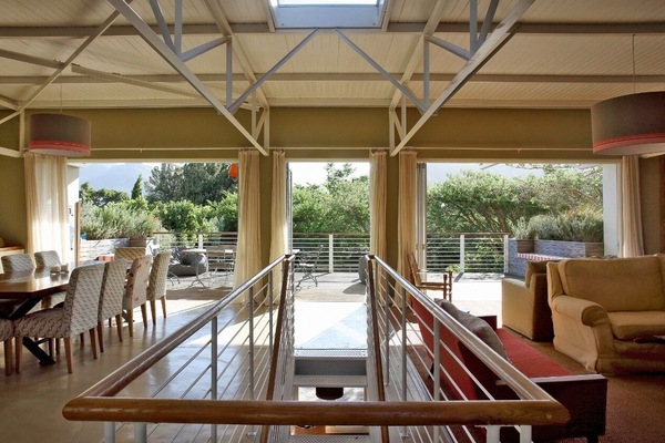 Deluxe House, Garden View | Living area | Flat-screen TV, fireplace