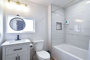 Shower, hair dryer, towels, shampoo - Remodeled Home - Steps from Brady Street! (Milwaukee)