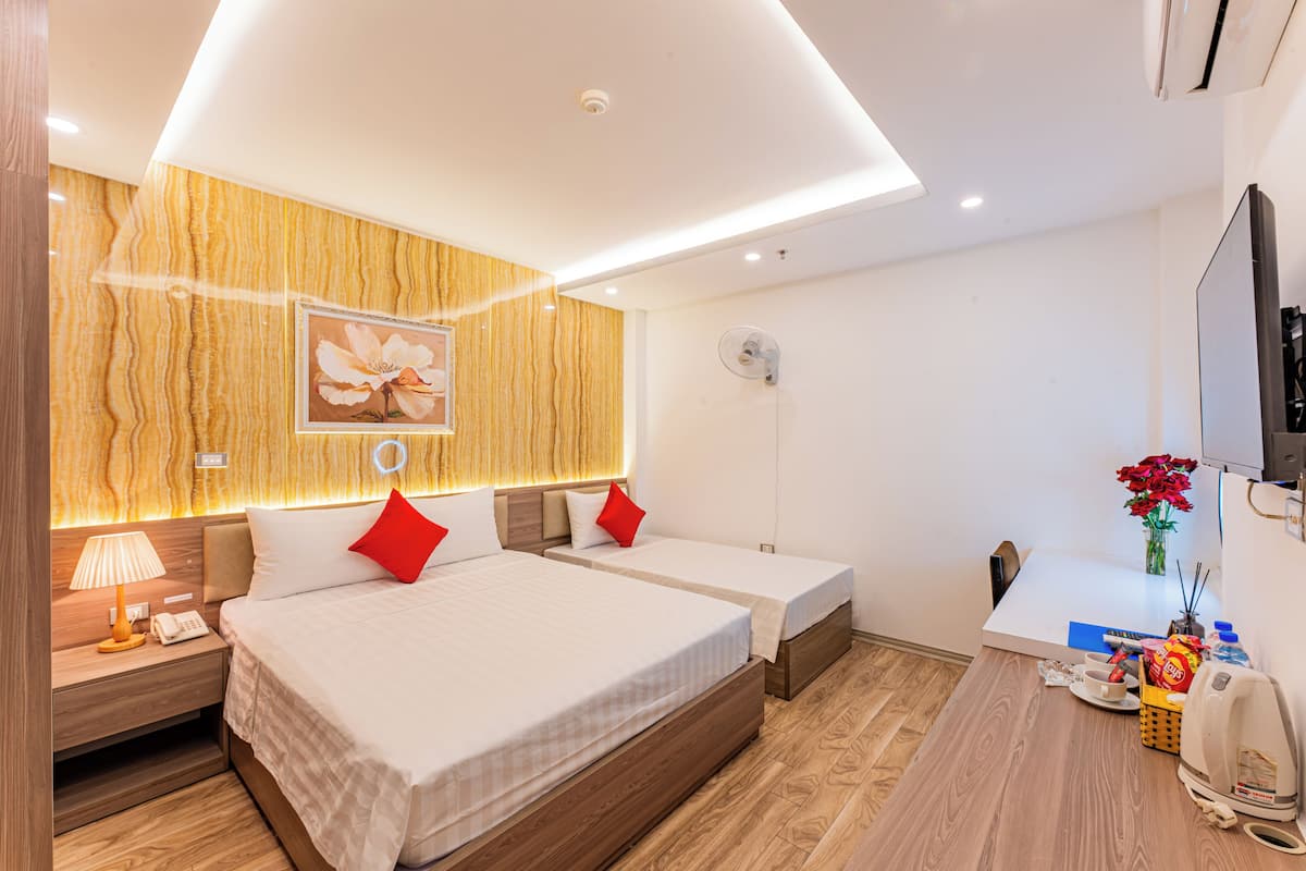 ห้องเบสิกทริปเปิล | เครื่องนอนระดับพรีเมียม, ผ้านวมขนเป็ด, มินิบาร์, โต๊ะทำงาน