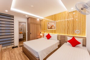 Basic Üç Kişilik Oda | Kaliteli yatak takımı, kuştüyü yorgan, minibar 