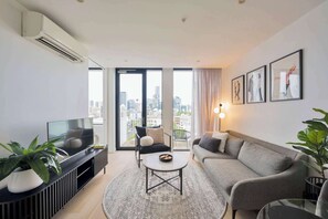 TV, stereo, offices - Elevated 2BR Near City | Views, Pool + Parking (Spring Hill)