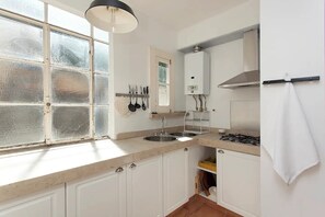 Fridge, microwave, cookware/dishes/utensils