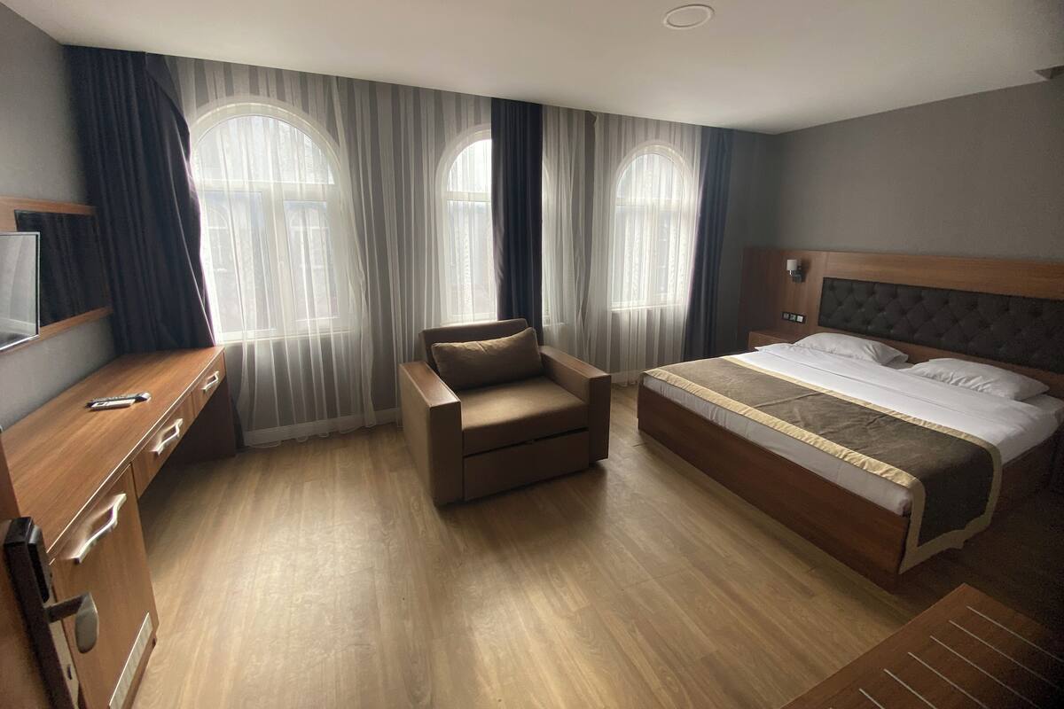 Deluxe Double Room, City View | In-room safe, desk, laptop workspace, blackout drapes