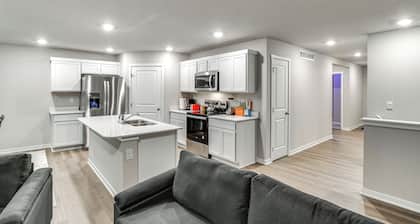 1 Mi to Golf: Quiet Waukee Home w/ Fireplace!