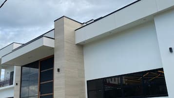Stylish two-story building with clean lines and large windows.