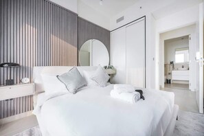 Desk, iron/ironing board, WiFi - StayShort - Soothing Studio Apartment in Collective Tower at Dubai Hills (Dubai)