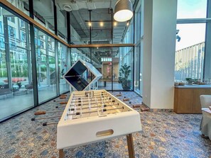 Games room - StayShort - Soothing Studio Apartment in Collective Tower at Dubai Hills (Dubai)