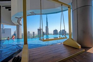 Pool - Free housekeeping visits during your stay - StayShort - Contemporary 2BR Apartment in Business Bay Ideal for 4 (Downtown/Business Bay)