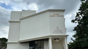 A modern hotel building with a prominent entrance and a sign indicating it is the Hotel Mysoore Radance. - Hotel Mysore Radiance (Mysore)