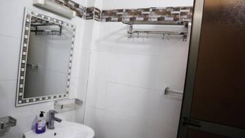 Hair dryer, towels, soap, shampoo