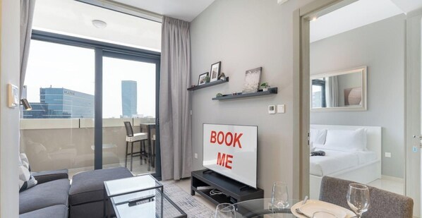 TV - StayShort - Stylish 1-Bedroom Apartment with Stunning Canal Views at Business Bay! (Downtown/Business Bay)