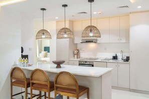 High chair - StayShort - Charming and Cozy 2BR Stay in Dubai Marina! (Marina/JBR)