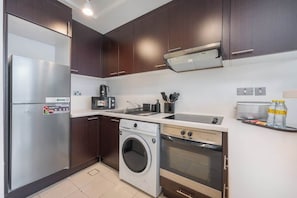 High chair - StayShort - Sky Gardens Studio with Skyscraper Views in DIFC! (DIFC)