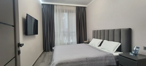 1 habitación, tabla de planchar con plancha, wifi y ropa de cama 