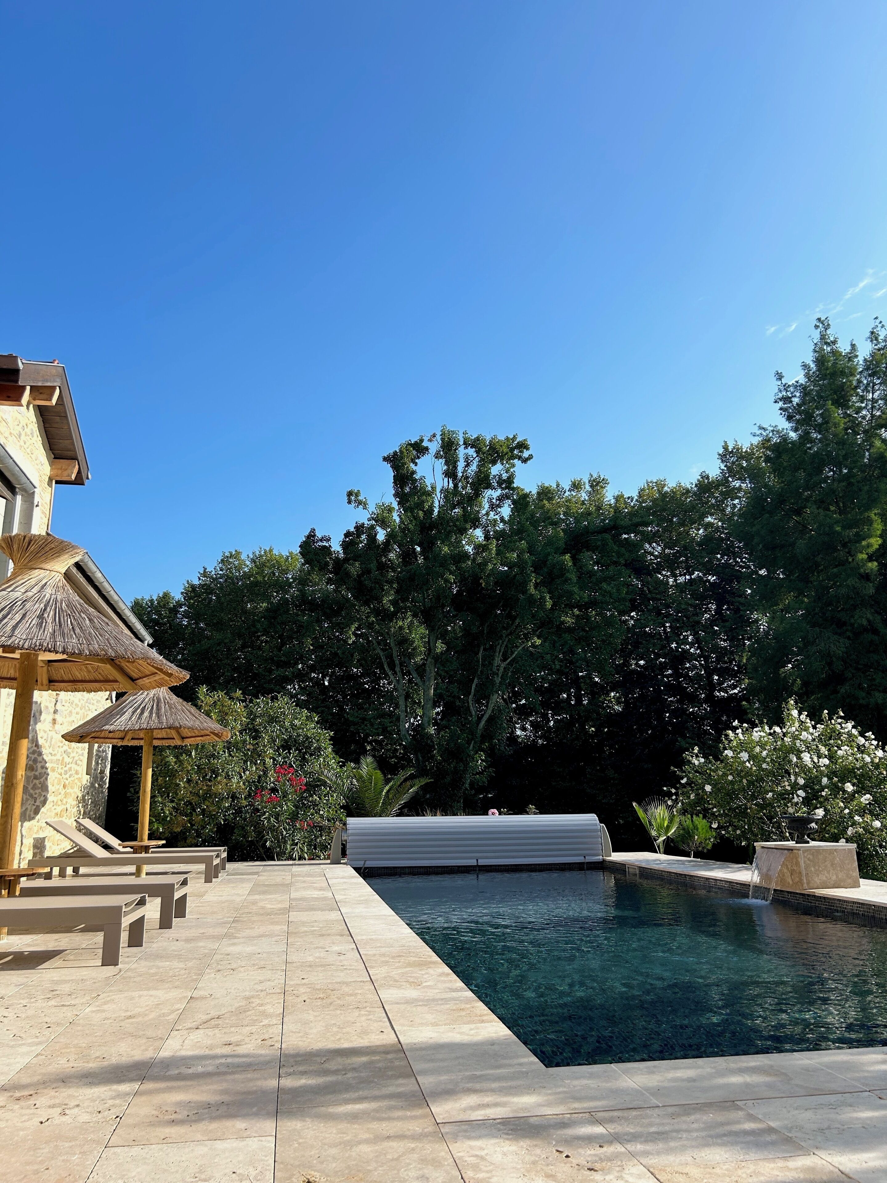 Seasonal outdoor pool, open 8:00 AM to 8:00 PM, pool umbrellas