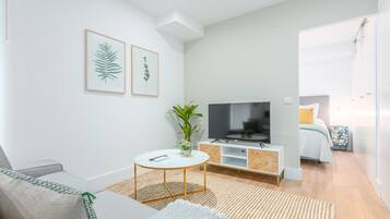 1 slaapkamer, een strijkplank/strijkijzer, beddengoed