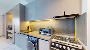 Fridge, microwave, stovetop, coffee/tea maker