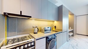 Fridge, microwave, stovetop, coffee/tea maker