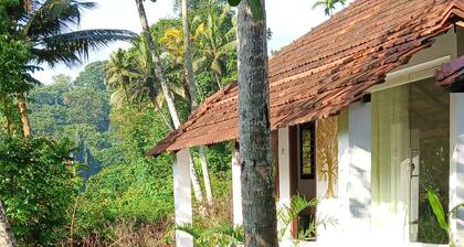 Canan Lake Home – A Serene Riverside Escape in God’s Own Country